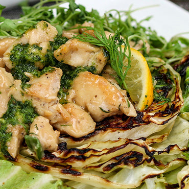 Lemon Dill Chicken on Charred Cabbage Steaks with Magical Herb Oil