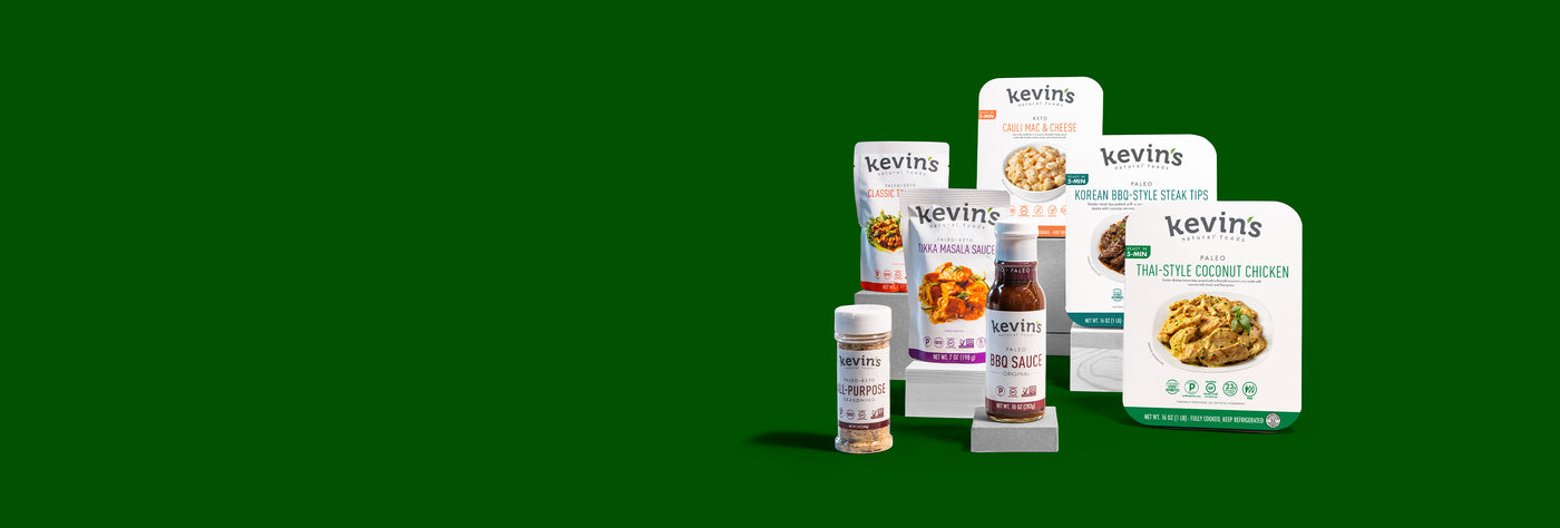 Assortment of Kevin's Natural Foods products on a green background.